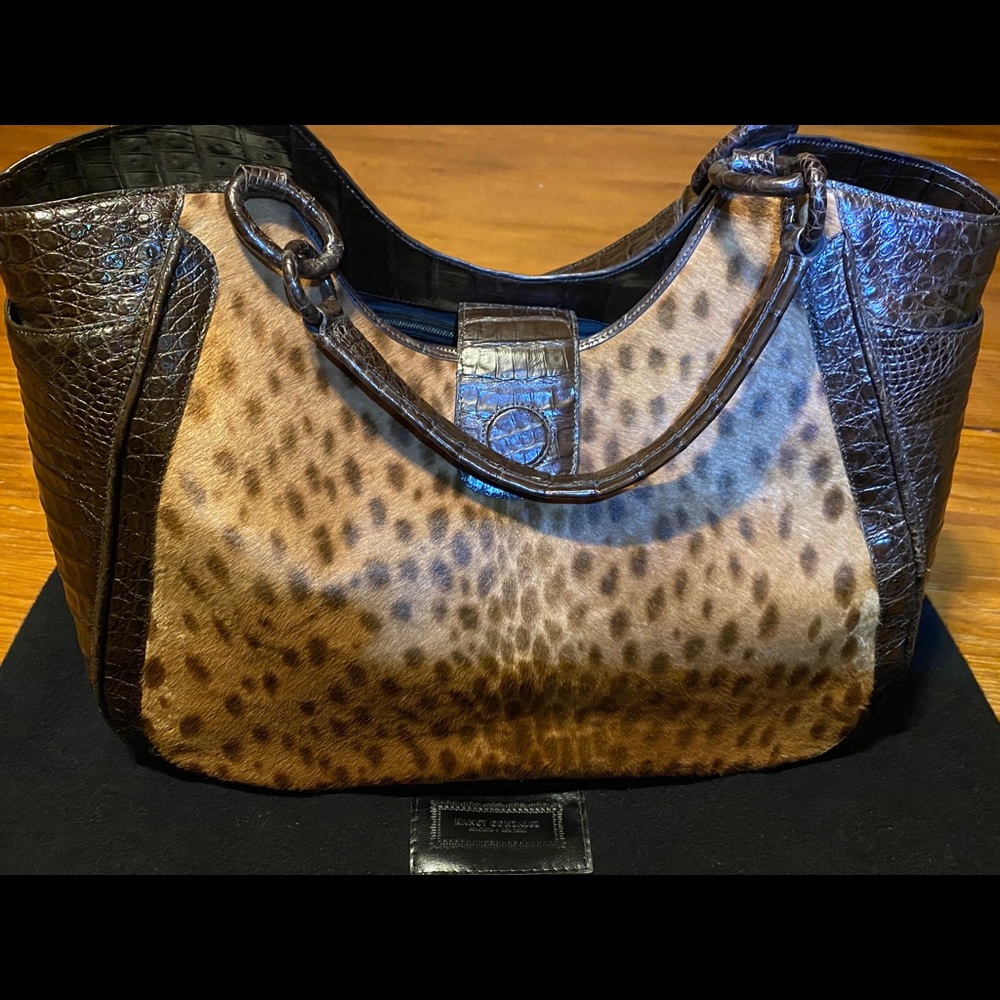 Nancy Gonzalez purse